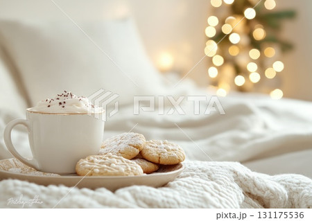 Cozy christmas scene with hot chocolate, cookies, and holiday lights Cozy christmas scene with hot chocolate, cookies, and holiday lights 131175536