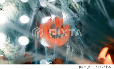 Crazy Halloween Pumpkin Among Haunted Cobwebs 131176190