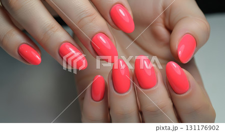 A close-up shot of a woman's hands with a perfect manicure 131176902