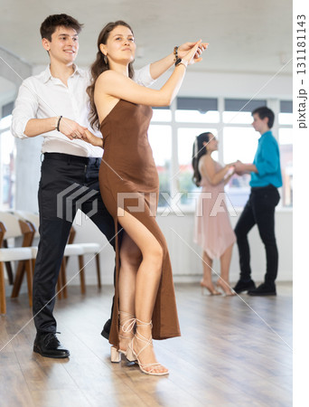 Couple young woman and man dancing waltz 131181143