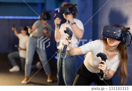 Friends using virtual reality glasses - people having fun with technology vr headset 131181313