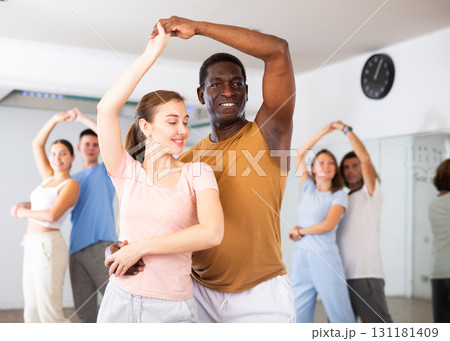 Adult male and young girl dancing pair dance Adult male and young girl dancing pair dance 131181409