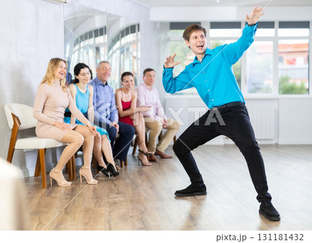 Young man showing dance moves 131181432