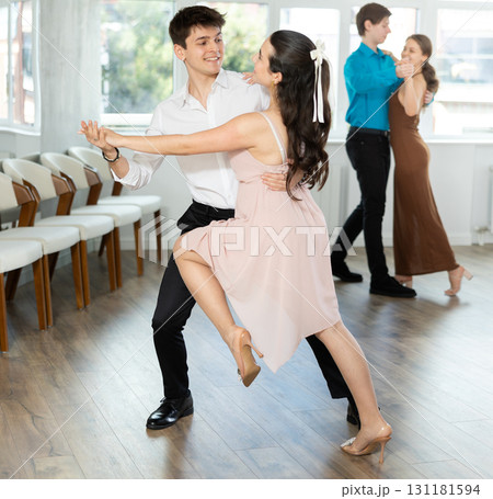 Couple young woman and man dancing tango 131181594