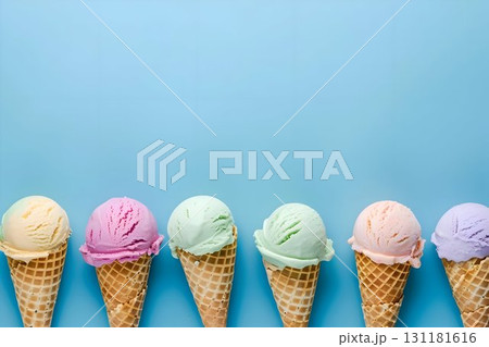 pastel-colored ice cream scoops resting in crispy waffle cones 131181616