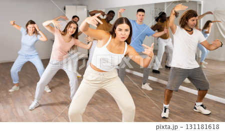 Dance class for people, positive women and men training in studio Dance class for people, positive women and men training in studio 131181618