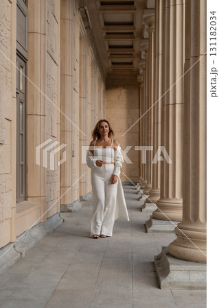 Woman White Outfit Walking Columns Architecture 131182034