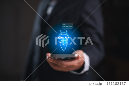 Businessman holding smartphone with virtual AI assistant chatbot hologram, smart technology for digital communication, innovation and artificial intelligence solutions in modern business. AI 131182187