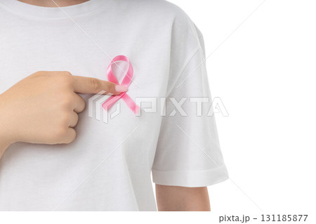 Person points at pink ribbon on shirt, isolated on white, PNG 131185877