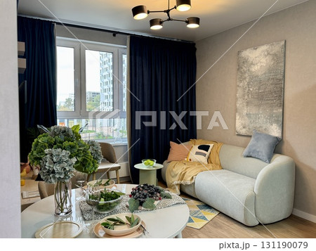 modern living room in a stylish interior of a new apartment with designer renovation 131190079