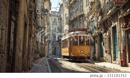 A yellow vintage tram travels along a cobblestone street in a historic city. A charming and timeless image of European travel and architecture 131191352