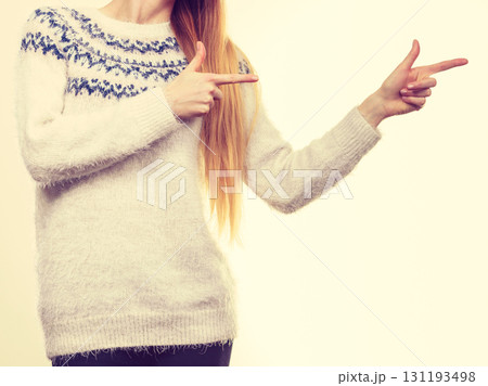 Woman legs in black trousers and furry jumper Woman legs in black trousers and furry jumper 131193498