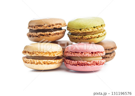 Different flavors of macarons. Colourful macaroons isolated on white background. 131196576