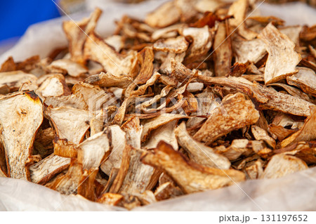 Lots of dried mushrooms in a bag at a rural fair 131197652
