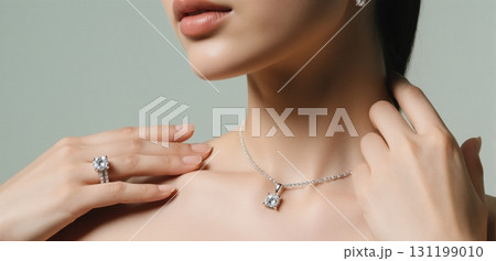 Elegant jewelry close-up showcasing diamond necklaces and rings in luxury fashion style Elegant jewelry close-up showcasing diamond necklaces and rings in luxury fashion style 131199010