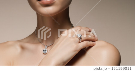 Elegant jewelry close-up showcasing diamond necklaces and rings in luxury fashion style Elegant jewelry close-up showcasing diamond necklaces and rings in luxury fashion style 131199011