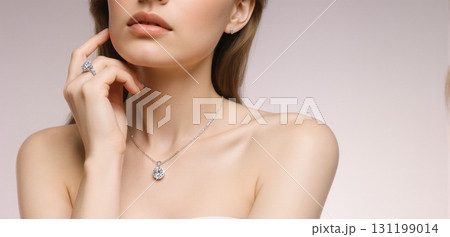 Elegant jewelry close-up showcasing diamond necklaces and rings in luxury fashion style Elegant jewelry close-up showcasing diamond necklaces and rings in luxury fashion style 131199014
