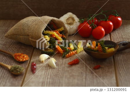 Italian Food background on wooden table. Top view. Italian Food background on wooden table. Top view. 131200091
