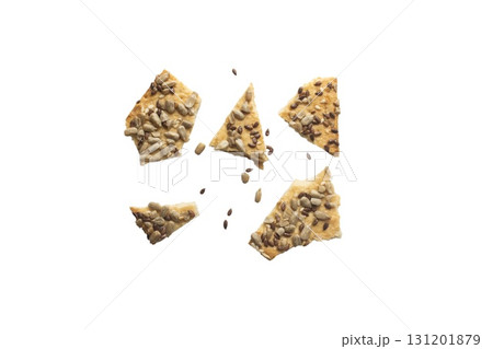 Stacked flax and sunflower seed cookies isolated on a white background are perfect for snack branding, packaging visuals, Stacked flax and sunflower seed cookies isolated on a white background are perfect for snack branding, packaging visuals, 131201879