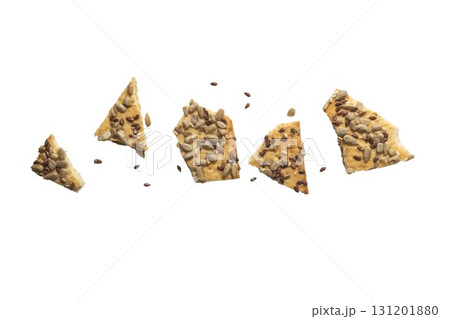 Stacked flax and sunflower seed cookies isolated on a white background are perfect for snack branding, packaging visuals, Stacked flax and sunflower seed cookies isolated on a white background are perfect for snack branding, packaging visuals, 131201880