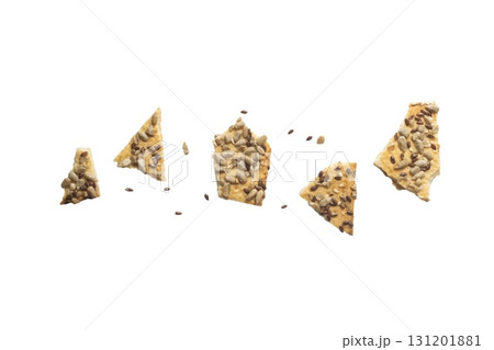 Stacked flax and sunflower seed cookies isolated on a white background are perfect for snack branding, packaging visuals, Stacked flax and sunflower seed cookies isolated on a white background are perfect for snack branding, packaging visuals, 131201881