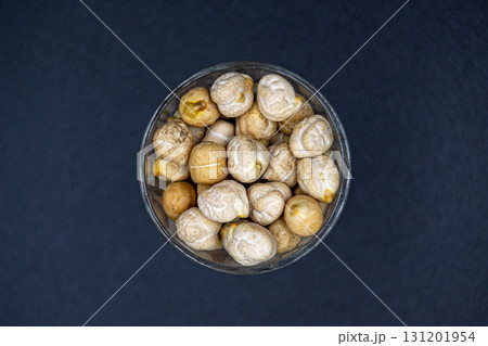 Beautiful organic dried chickpea beans consisting of raw bengal legume pea 131201954