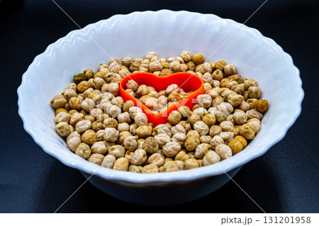 Beautiful organic dried chickpea beans consisting of raw bengal legume pea Beautiful organic dried chickpea beans consisting of raw bengal legume pea 131201958