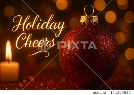 Holiday Cheers text with glowing candle and red bauble ornament on festive background. 131203636