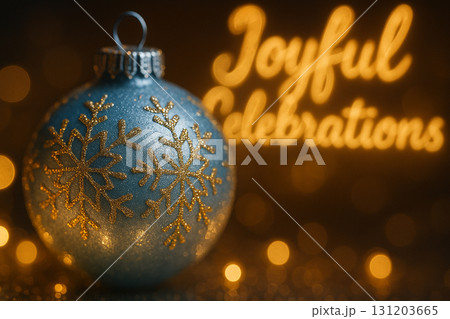 Joyful Celebrations text with golden bauble on glowing festive background. 131203665