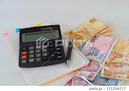 Turkish lira with a Calculator and a Pen Turkish lira with a Calculator and a Pen 131204217