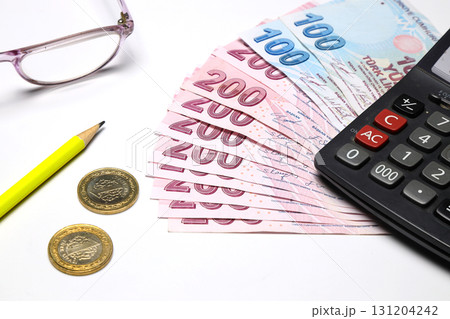 Turkish lira with a Calculator and a Pen 131204242