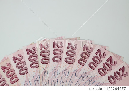 Turkish Lira banknotes of various color, pattern and value on white background Turkish Lira banknotes of various color, pattern and value on white background 131204677
