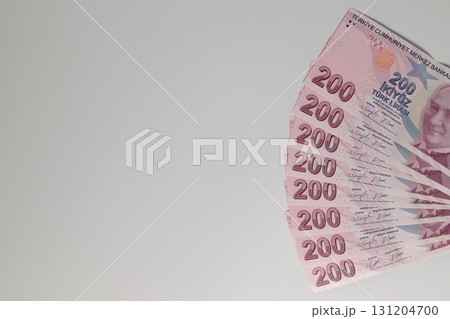 Turkish Lira banknotes of various color, pattern and value on white background Turkish Lira banknotes of various color, pattern and value on white background 131204700