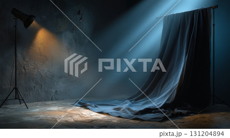 Moody Studio Backdrop with Black Velvet Fabric and Dramatic Lighting 131204894