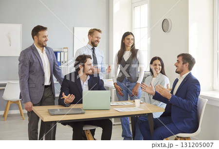 Young people group of company employees talking on business meeting during a conference. 131205007
