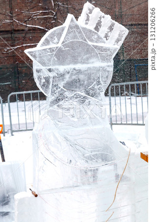 Ice sculpture creation on the city's central square 131206266