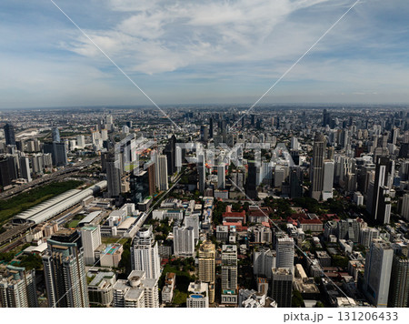Urban skyline featuring modern buildings and residential towers, clear skies in the background. Bangkok, Thailand. 131206433