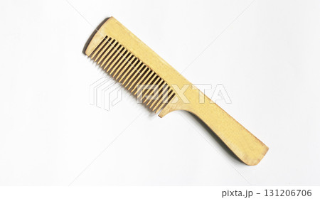 A wooden comb isolated on white background 131206706