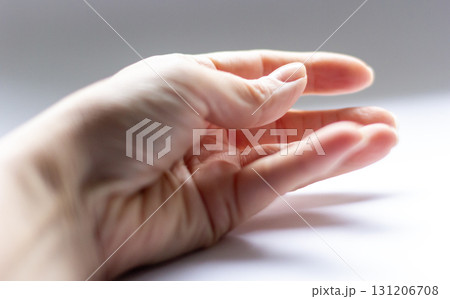 Female hand on white background 131206708