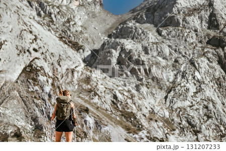 Woman Tourist Hiking in Alpine Mountainous Landscape 131207233