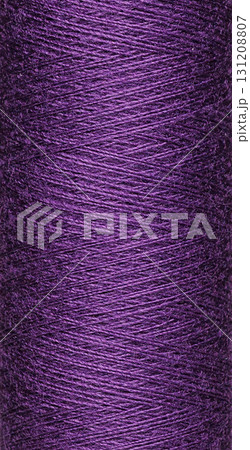 macro texture of a skein of purple sewing thread 131208807