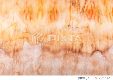 abstract pattern on silk fabric texture in yellow and brown tones abstract pattern on silk fabric texture in yellow and brown tones 131208852