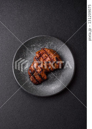 Meat, juicy beef steak grilled cooked to perfection for lunch. Barbecued steak 131209075