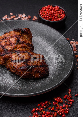 Meat, juicy beef steak grilled cooked to perfection for lunch. Barbecued steak Meat, juicy beef steak grilled cooked to perfection for lunch. Barbecued steak 131209084