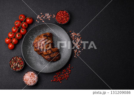 Meat, juicy beef steak grilled cooked to perfection for lunch. Barbecued steak Meat, juicy beef steak grilled cooked to perfection for lunch. Barbecued steak 131209086