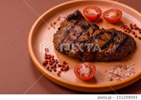 Meat, juicy beef steak grilled cooked to perfection for lunch. Barbecued steak 131209093
