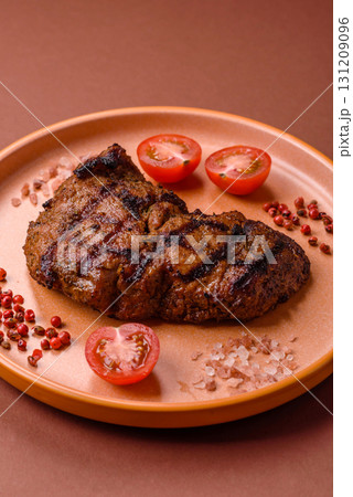 Meat, juicy beef steak grilled cooked to perfection for lunch. Barbecued steak Meat, juicy beef steak grilled cooked to perfection for lunch. Barbecued steak 131209096