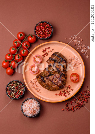 Meat, juicy beef steak grilled cooked to perfection for lunch. Barbecued steak Meat, juicy beef steak grilled cooked to perfection for lunch. Barbecued steak 131209103