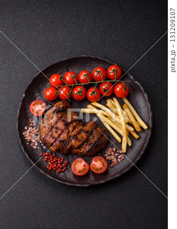 Meat, juicy beef steak grilled cooked to perfection for lunch. Barbecued steak 131209107