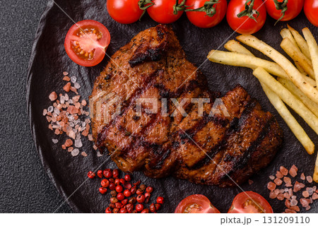 Meat, juicy beef steak grilled cooked to perfection for lunch. Barbecued steak Meat, juicy beef steak grilled cooked to perfection for lunch. Barbecued steak 131209110